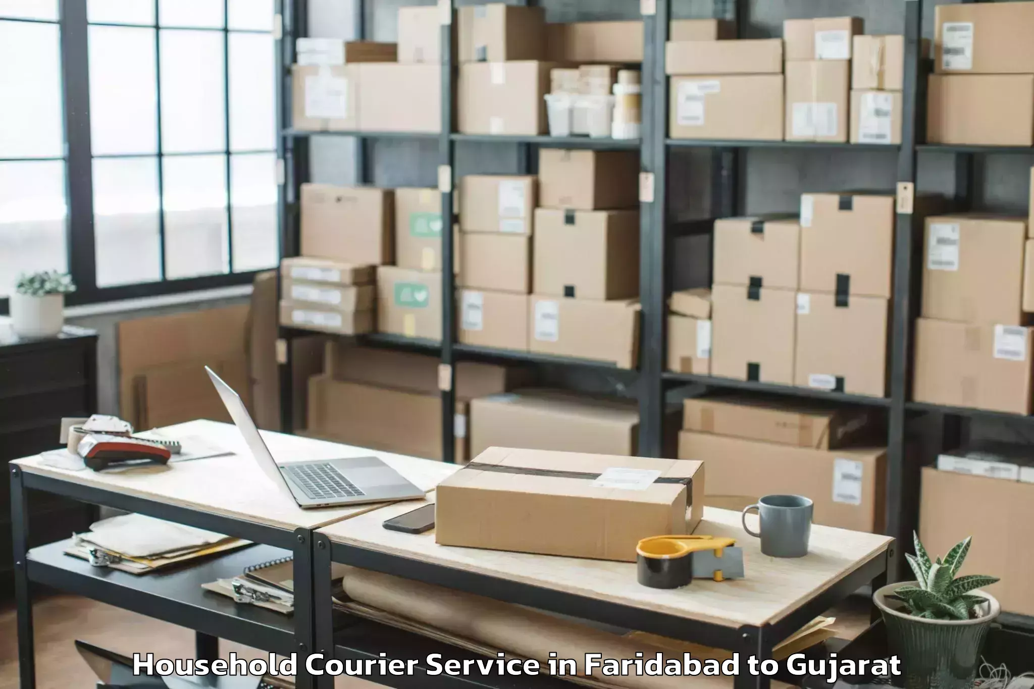 Top Faridabad to Gandhinagar Household Courier Available